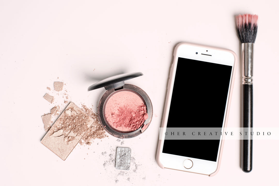 Makeup & Smart Phone on Pink Background, Styled Stock