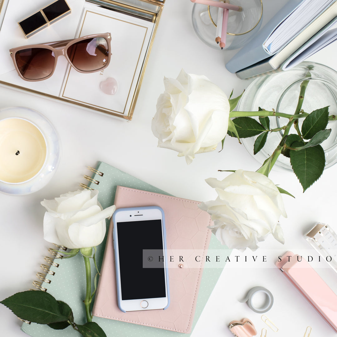 Smartphone, Roses and Sunglasses Workspace