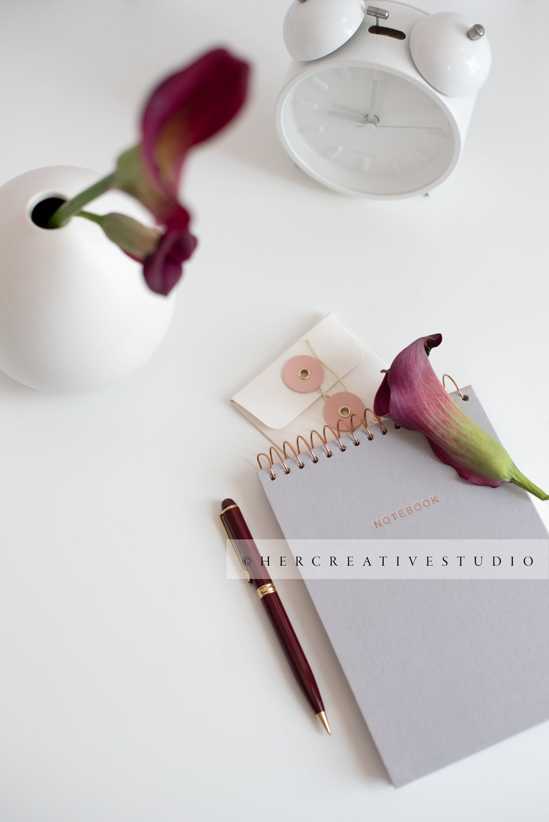 Calla Lilly, Notebook & Clock on White Background