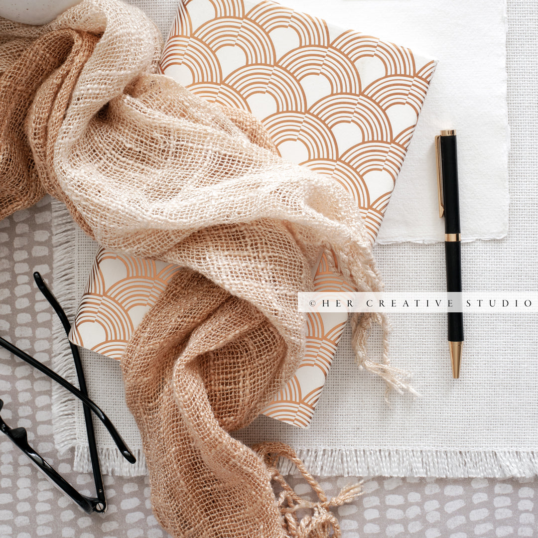 Scarf and Notebook in a Peach Tone, Stock Image