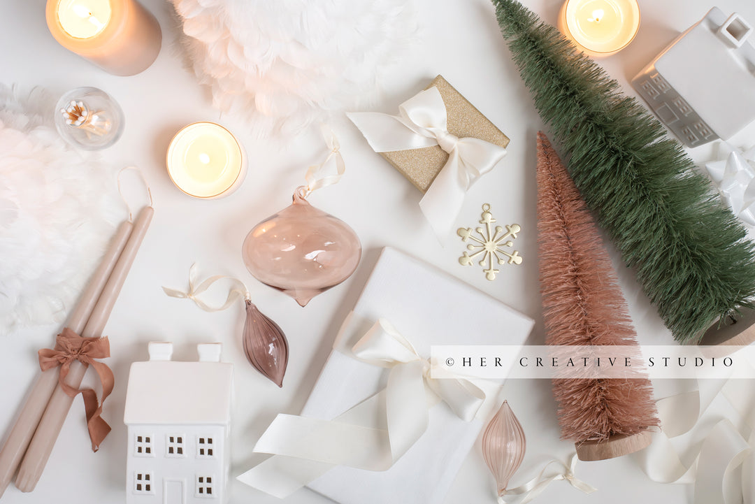 Holiday Styled Image with Trees, Lit Candles & Ornaments