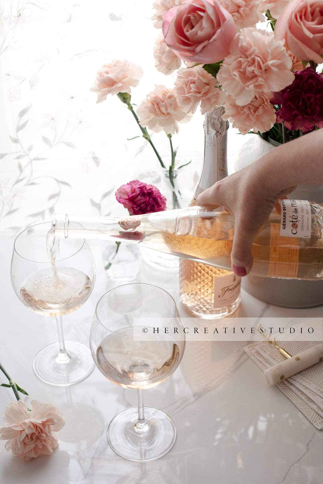 Hand Pouring Glass of Wine, Styled Image
