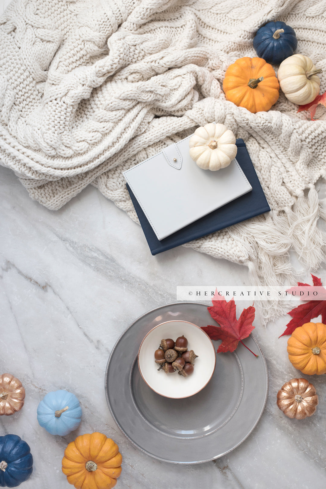 Pumpkins, Notebook & Maple Leaf on Marble