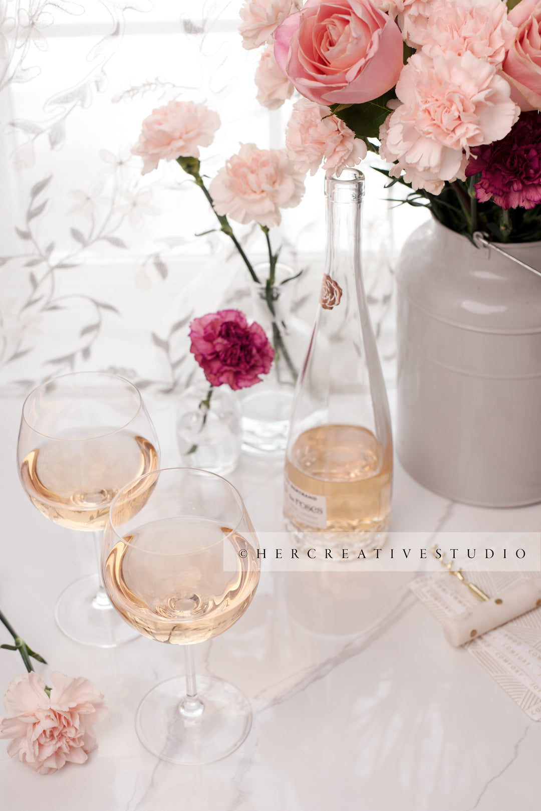 Glasses of Wine and Flowers on Marble Background, Styled Image