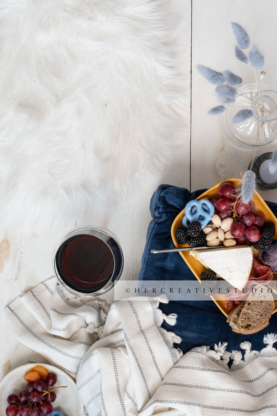 Cheese, Wine & Bunny Tails on White Background