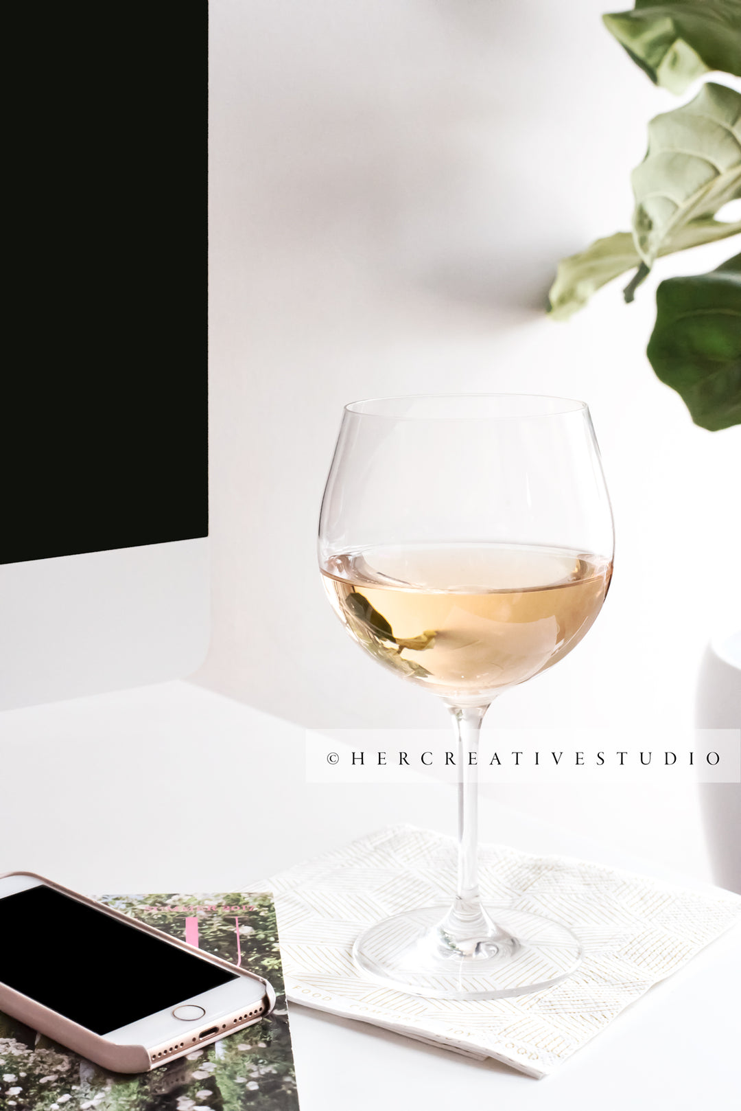 Glass of Wine on Her Workspace, Styled Image