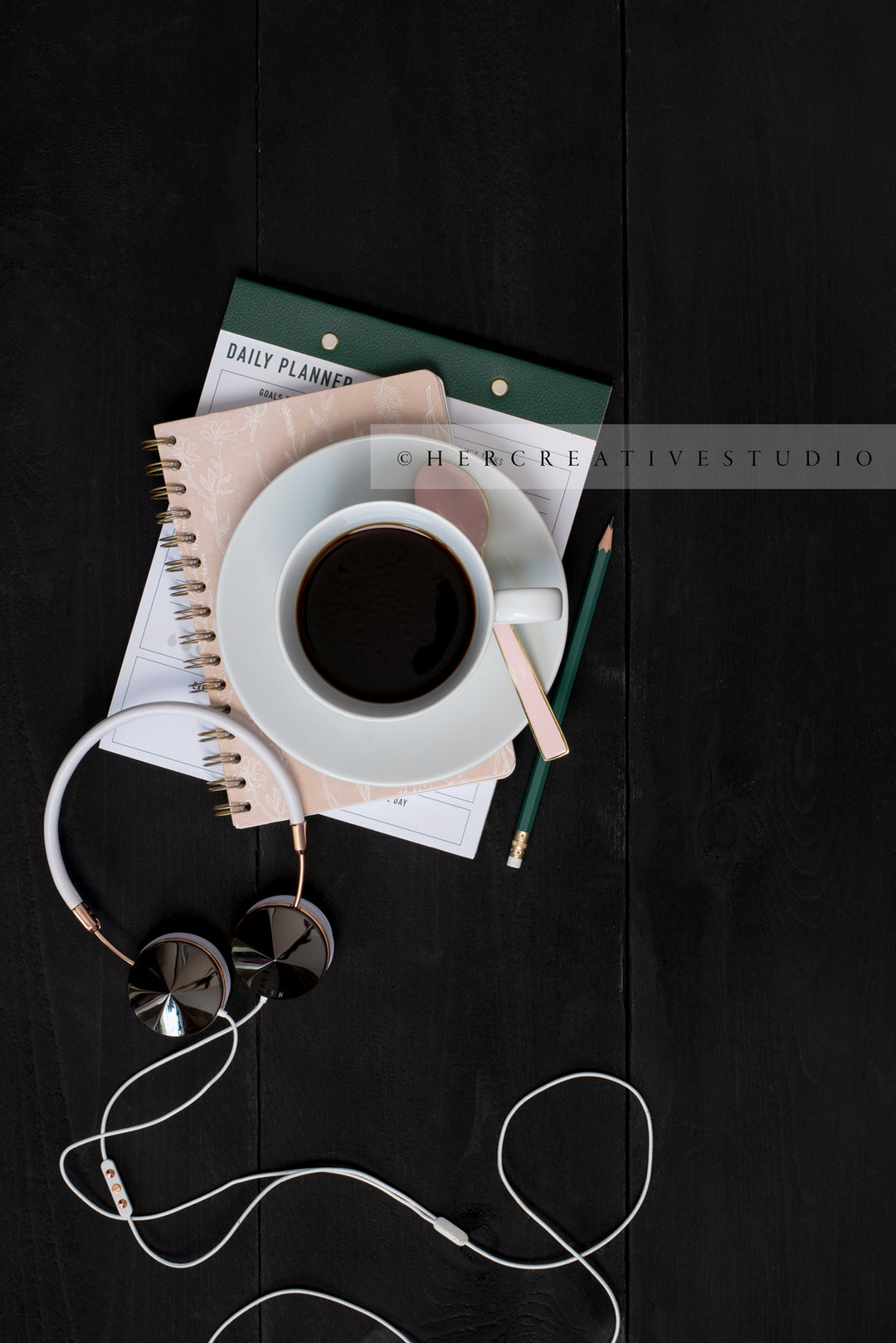 Notebook, Coffee & Headphones on Black Background