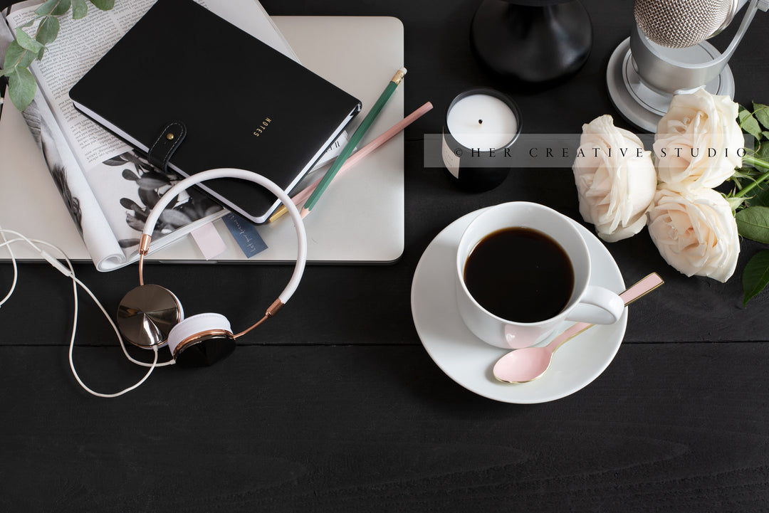Coffee & Headphones on Black Background