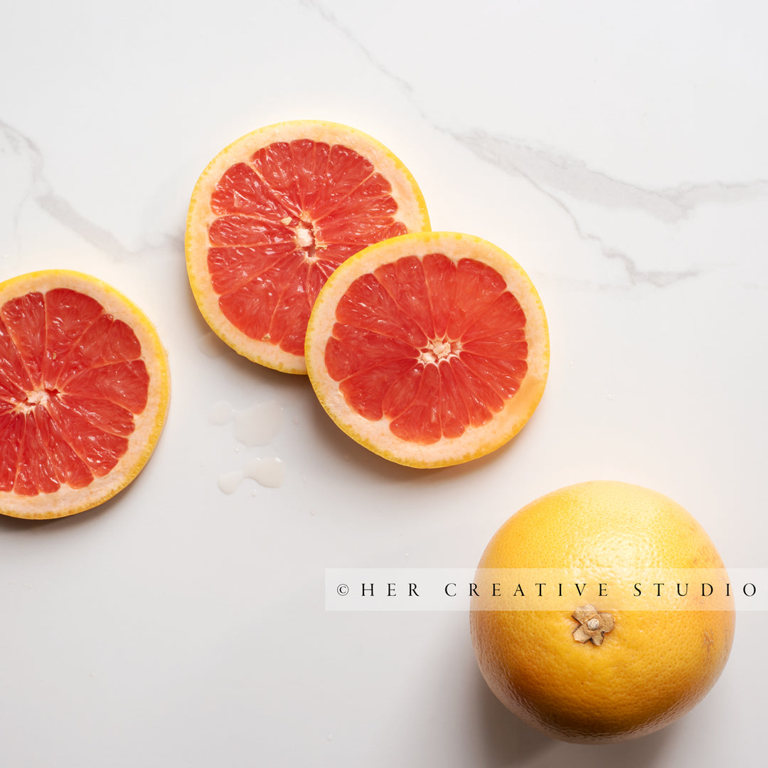 Grapefruit on Marble Background